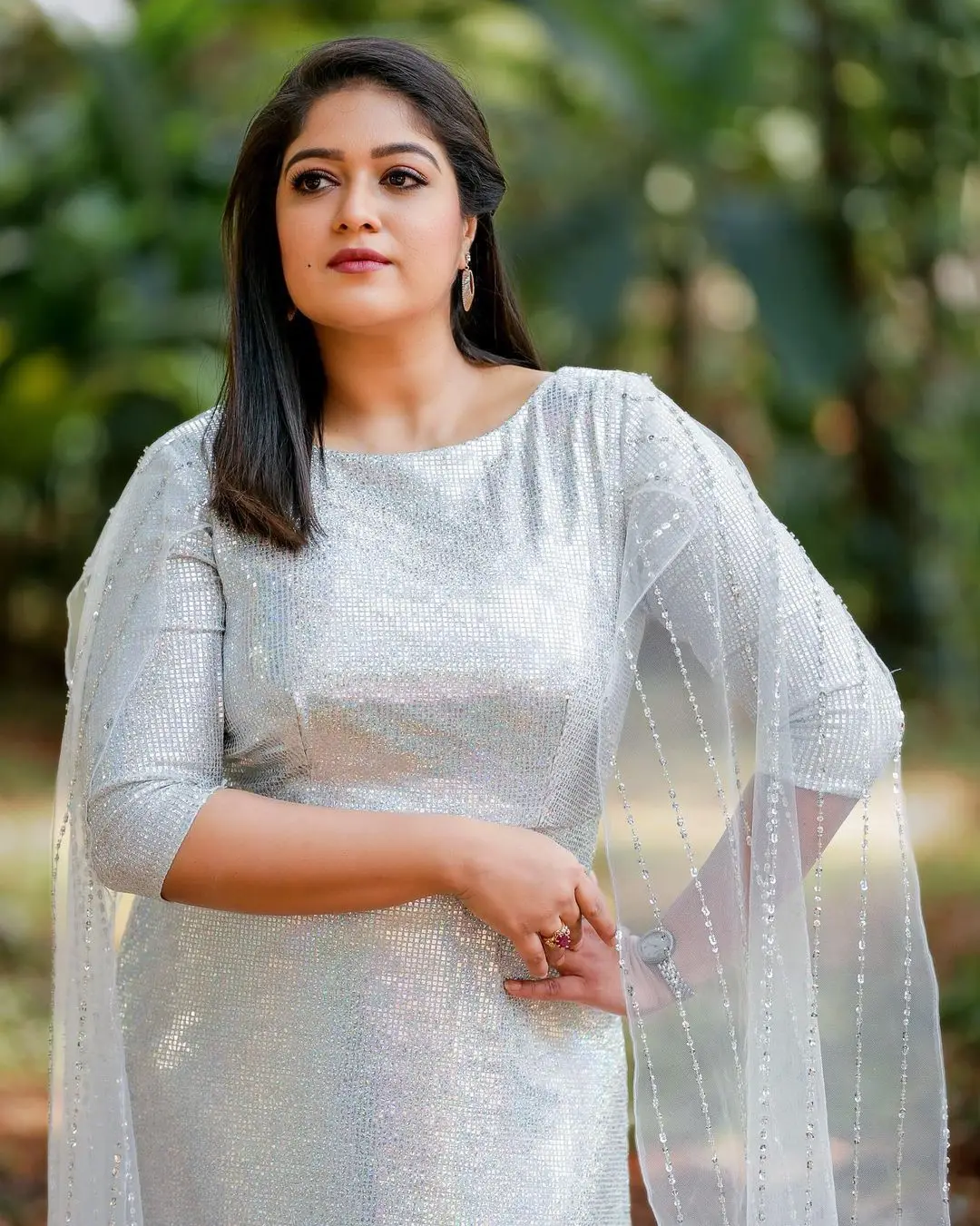 Actress Meghana Raj Stills in Beautiful White Gown